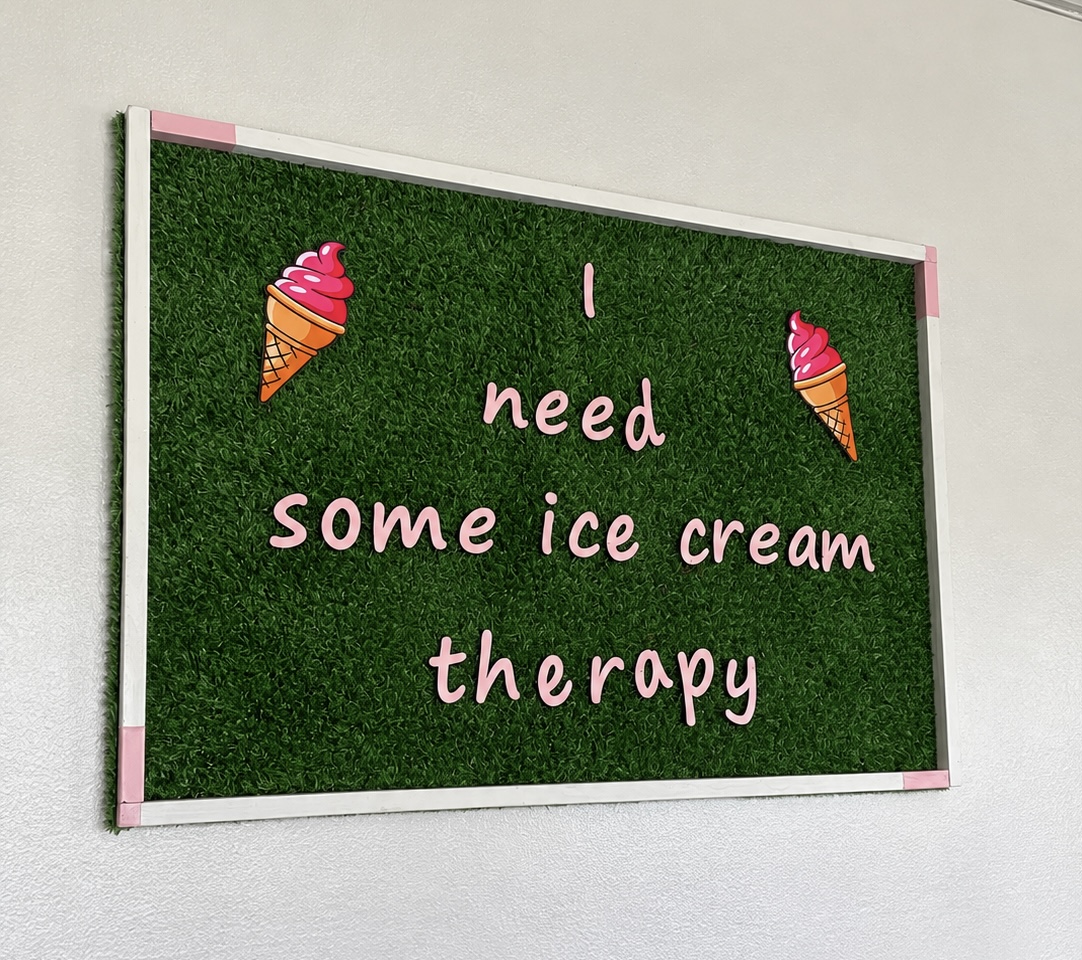 'I need some ice cream therapy' sign on the wall inside Dairy Den